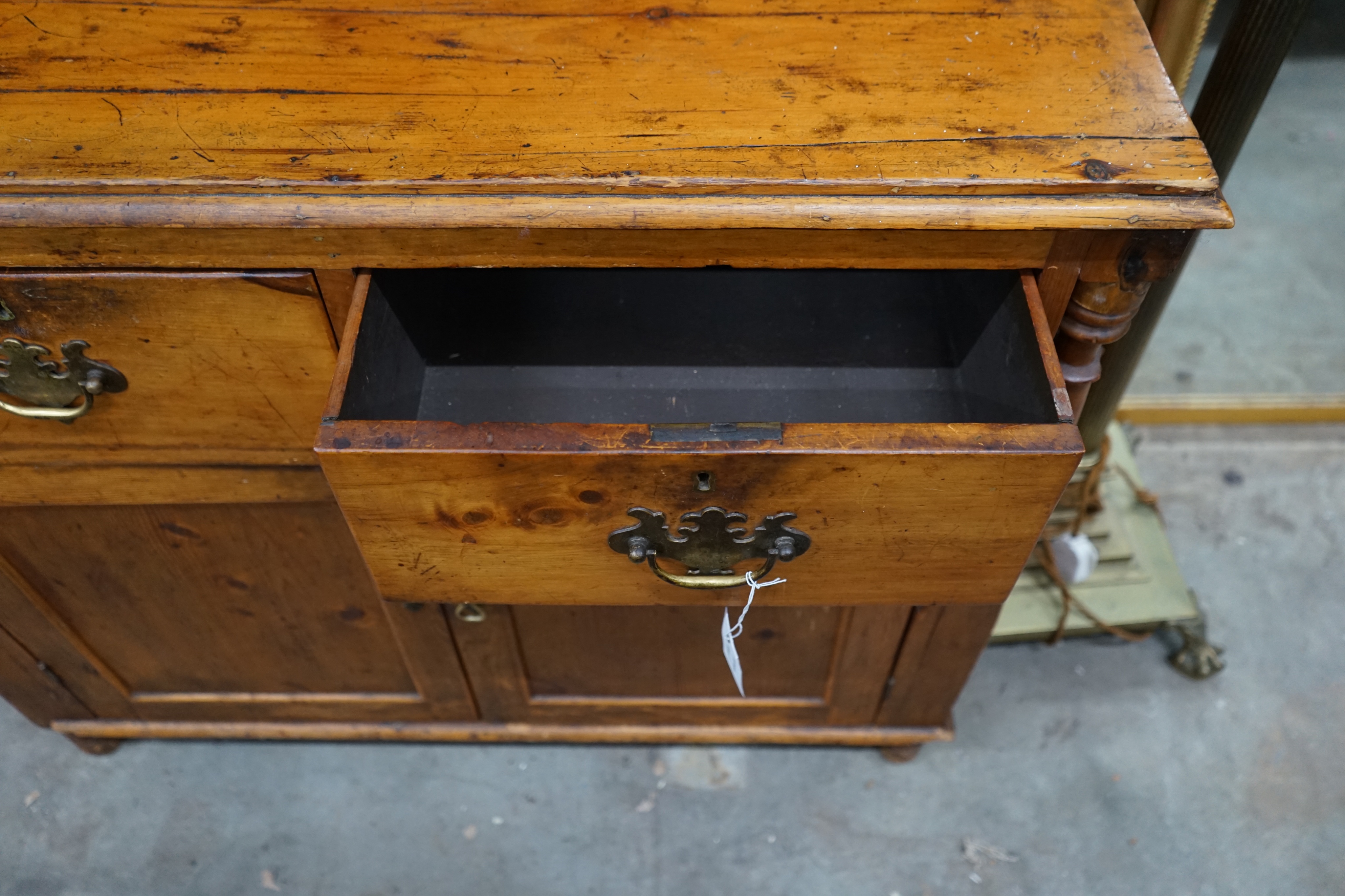 A small Victorian pine dresser, width 95cm depth 41cm height 193cm